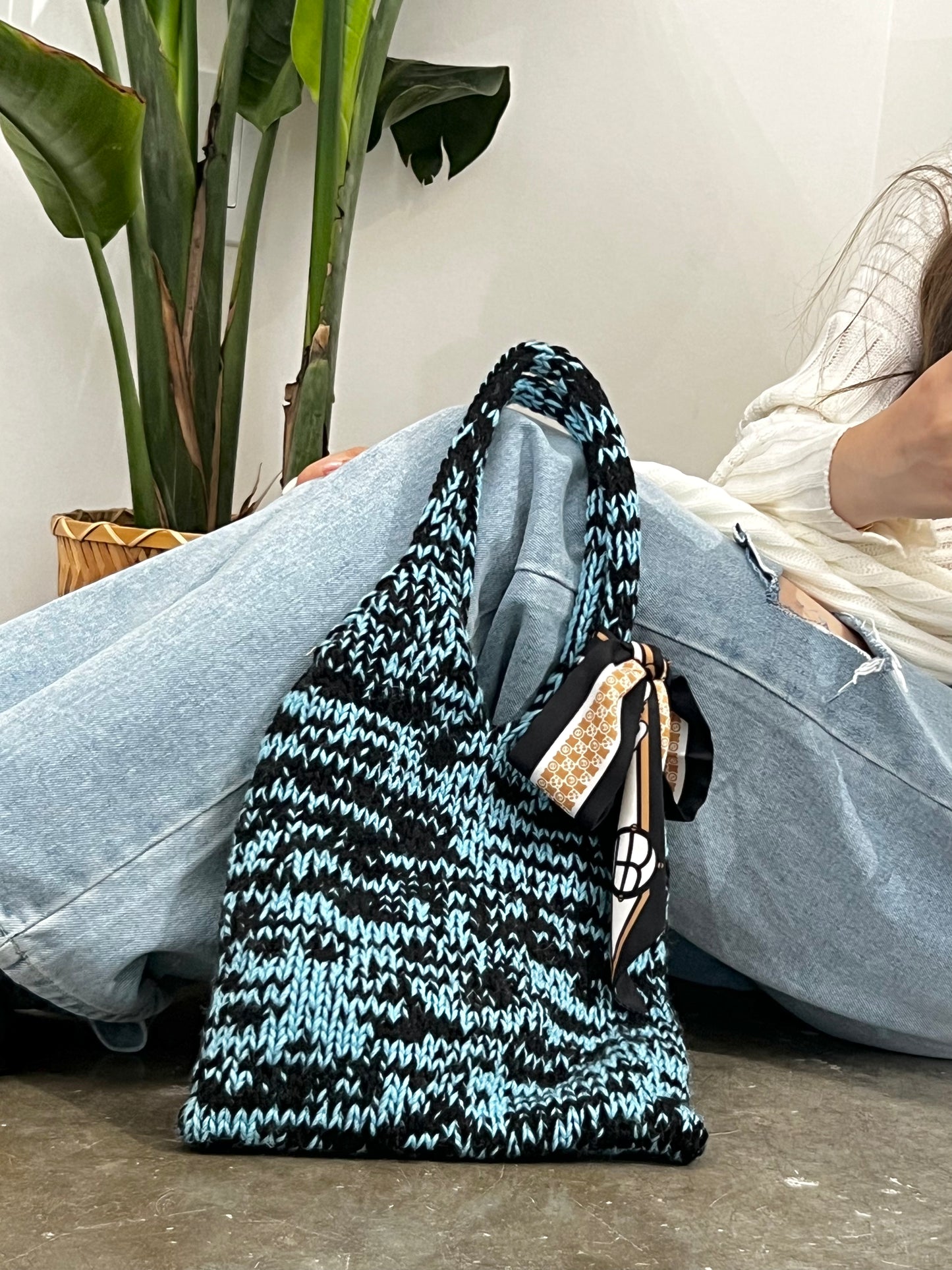 Mom’s blue and black bag with scarf