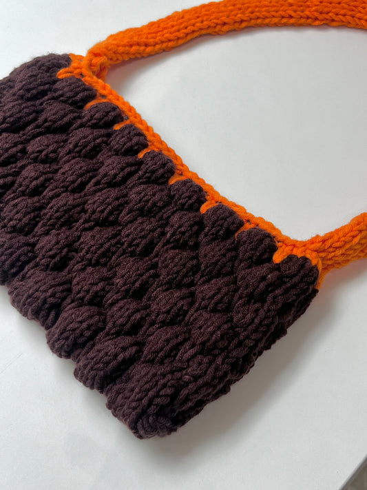 Mom’s dark brown & orange bag