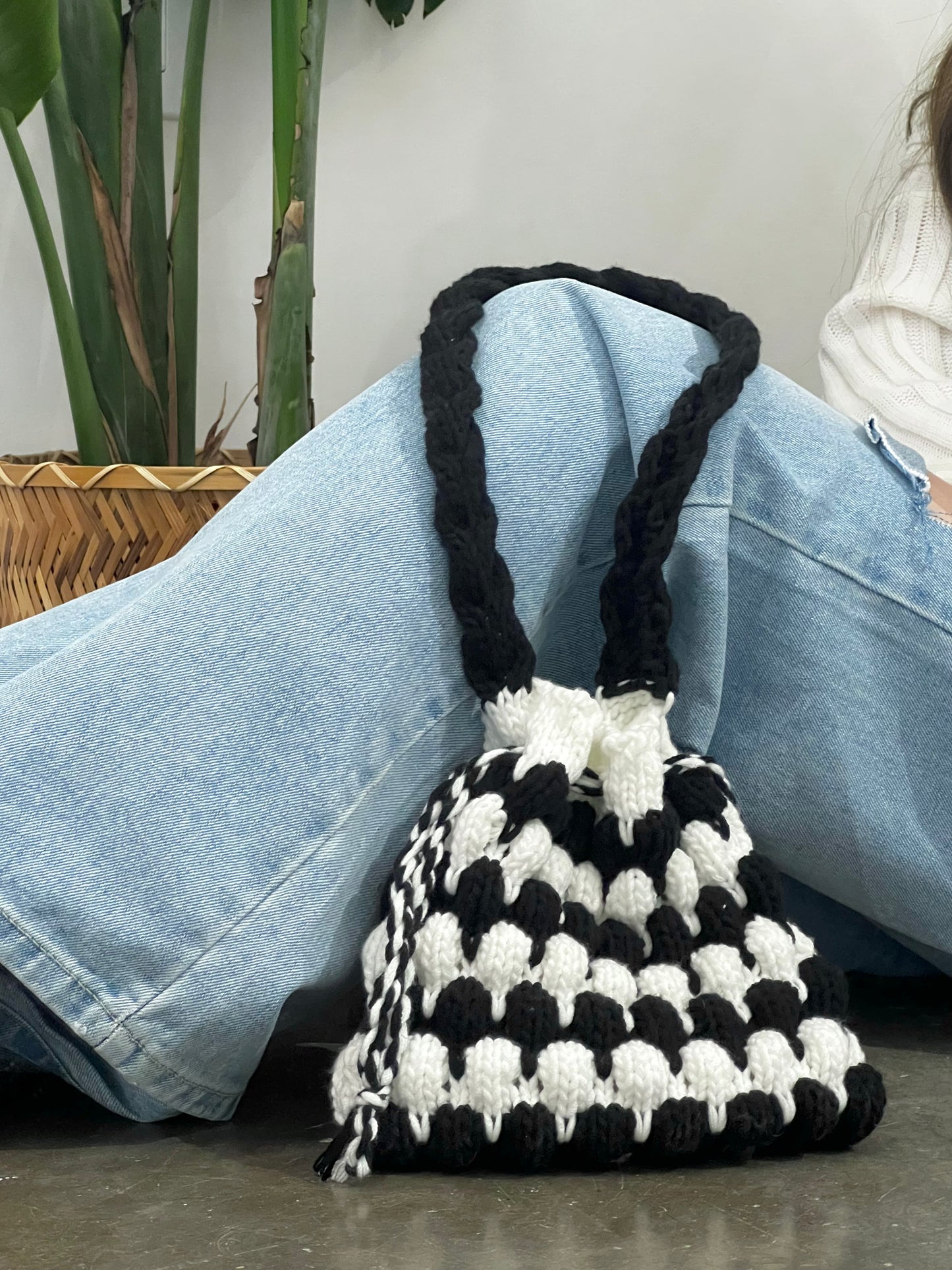 Mom’s black and white big handbag