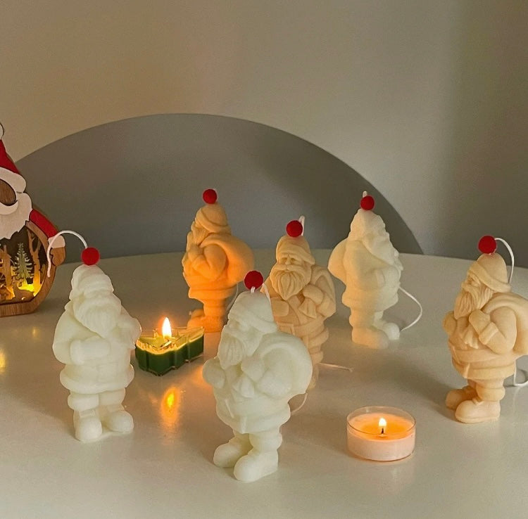 SANTA WITH GIFT CANDLE