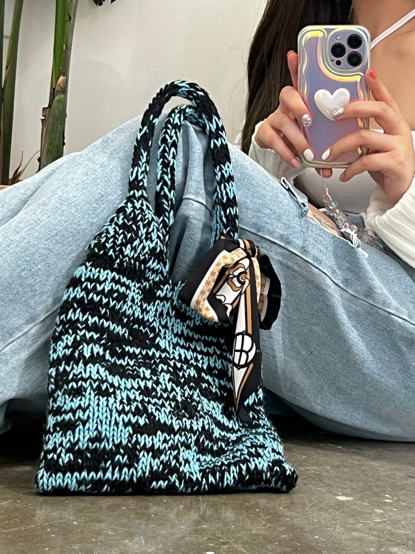 Mom’s blue and black bag with scarf